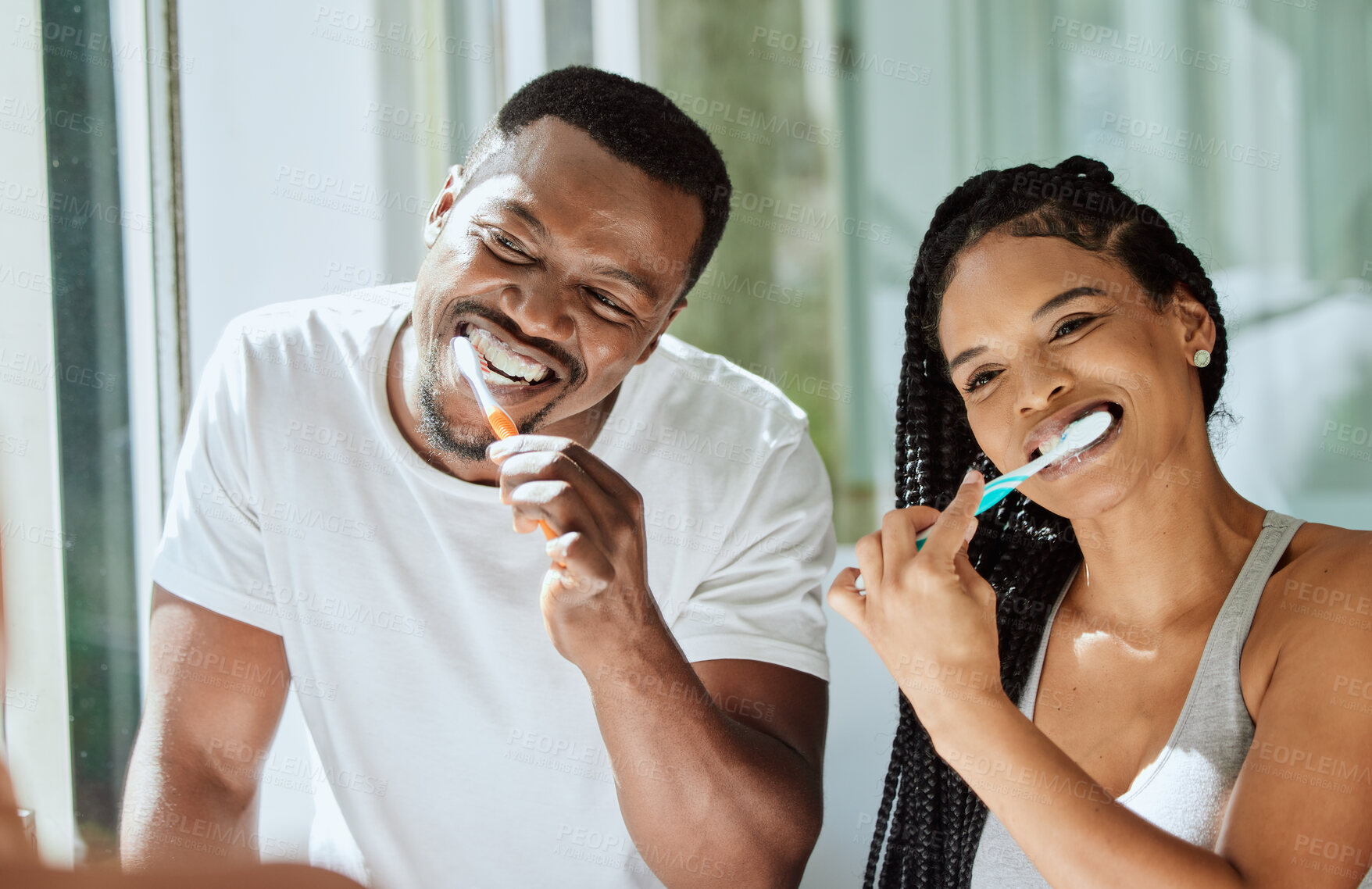 Buy stock photo Black couple, brushing teeth and dental cleaning in bathroom together for grooming hygiene, beauty wellness and healthcare with toothbrush. African man, woman and happy oral care morning routine