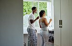 Brushing teeth, dental and oral care with a black couple grooming together in the bathroom of their home. Health, hygiene and cleaning with a man and woman bonding during their morning routine