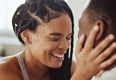 Buy stock photo Black couple, face and laugh in bedroom, romance and morning for bonding, care and romance in home. Happy couple, smile and touch for happiness, holiday or vacation in hotel room, apartment and relax