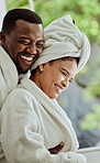 Love, wellness and relax with a black couple in a health spa or luxury resort for romance and dating. Vitality, rest and relaxation with a man and woman at a resort for a romantic weekend getaway