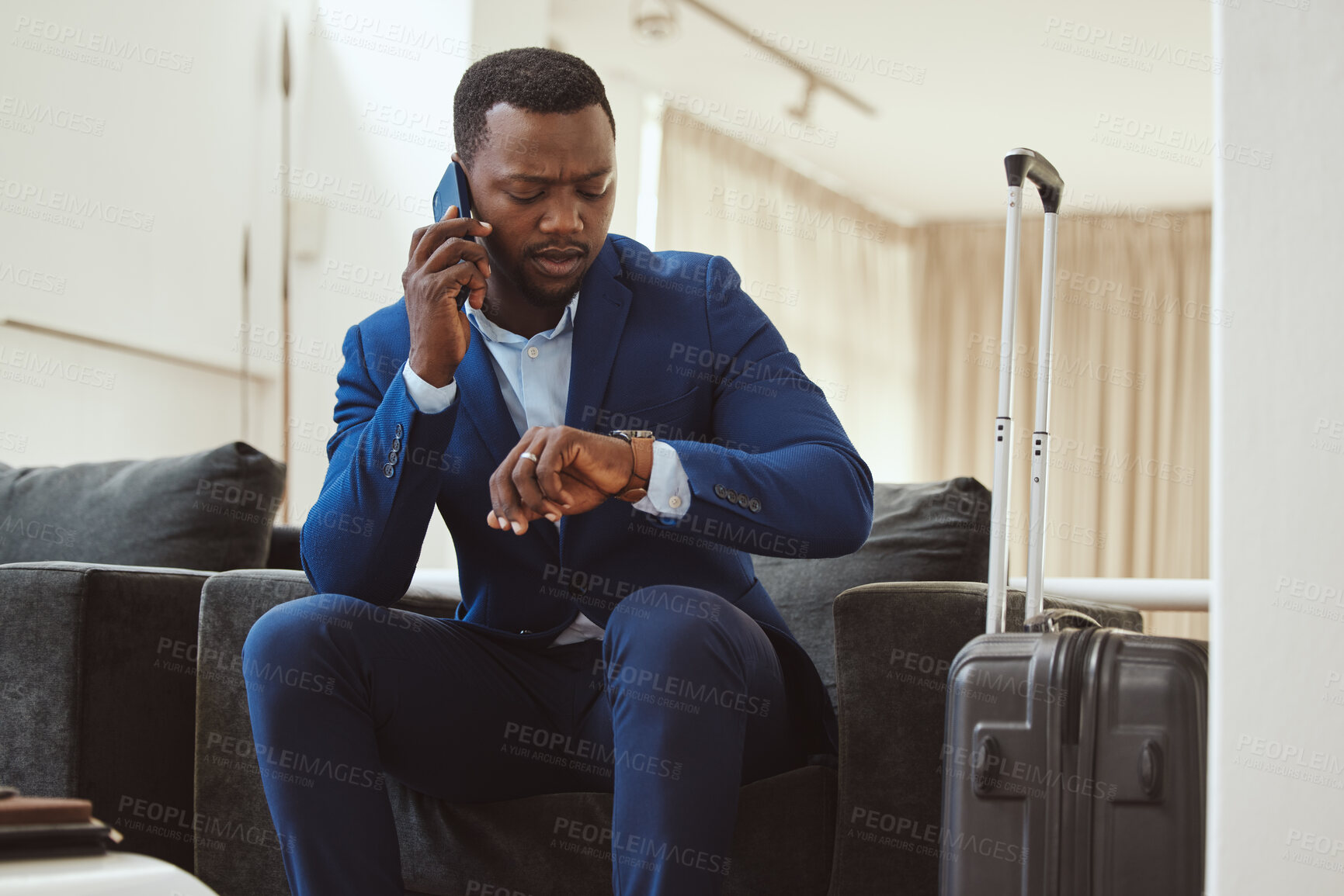 Buy stock photo African businessman, checking time in hotel and phonecall for work travel schedule in Atlanta. Young black entrepreneur speaking on cellphone, professional time management or luxury airport travel