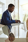 Email, business and black man planning on a laptop, internet research and reading information for work. Corporate, executive and African businessman typing on pc for connection with table reflection