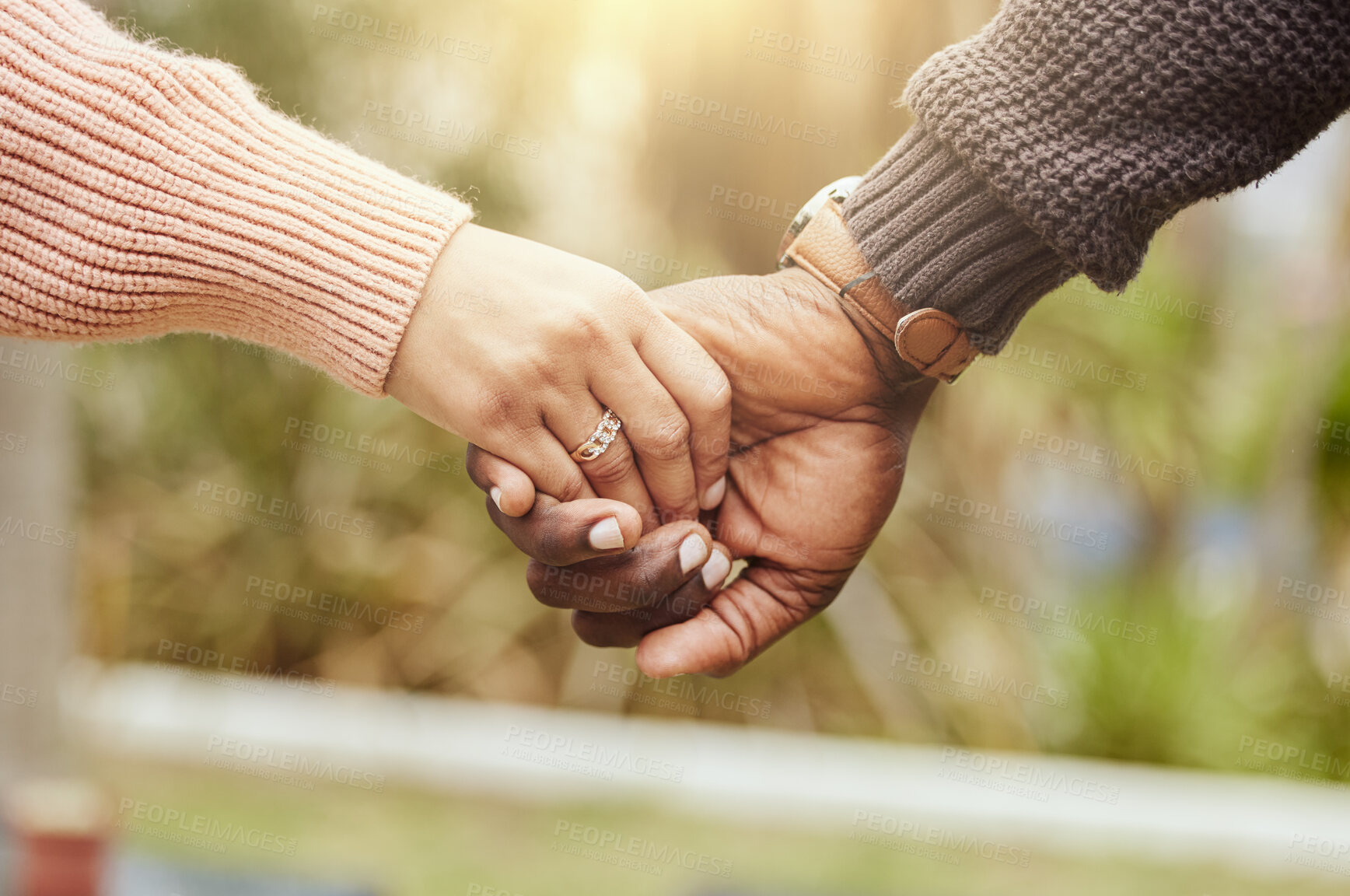 Buy stock photo Love, support and trust hands of black couple in marriage together with care, romance and unity. Soulmate, married and man with woman holding hands for romantic bonding moment in nature zoom.