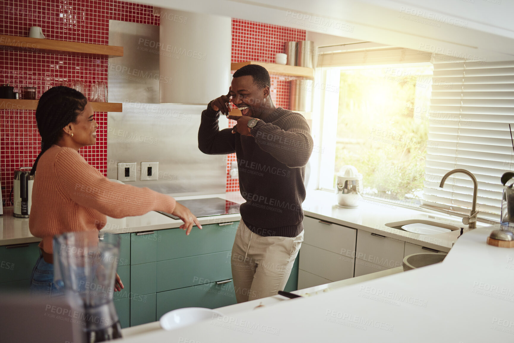 Buy stock photo Black couple, dancing and happy together in the kitchen for fun and happiness in a marriage with commitment. Man and woman dance to music while in the kitchen to celebrate their house or apartment