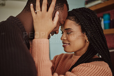 Buy stock photo Black couple, love and care while together for happiness in a happy marriage with commitment and care. Young man and woman touching face of head while in a house to bond, intimate and show commitment