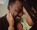 Black couple, face and love while together at home with care and happiness in a healthy marriage with commitment. Young man and woman intimate while in the kitchen to bond in their house or apartment