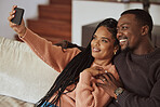 Black couple,  phone selfie and love while together on home couch with care and happiness in a happy marriage. Young man and woman with a smile for social media while bonding in an apartment lounge 