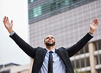 Businessman celebration, city and winning with smile, success or suit in financial advisor job. Corporate man, hands and air goals, vision or motivation by metro buildings with happiness in New York