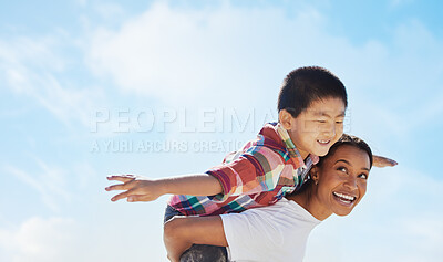 Buy stock photo Mom, piggyback airplane and child by sky with smile, family bonding or outdoor vacation in summer. Happy family, interracial and black woman back for asian adoption, love or game on holiday adventure