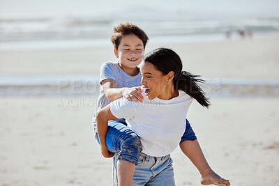Buy stock photo Mother, beach piggyback and asian child with smile, family bonding and outdoor vacation in sunshine. Happy family, interracial and ride on woman back for adoption, love and game by ocean for holiday