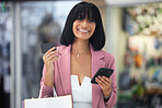 Happy woman, shopping and portrait with credit card using phone for ecommerce payment and online banking. Paper bag, fashion and female excited about discount, promotion and commerce app on travel