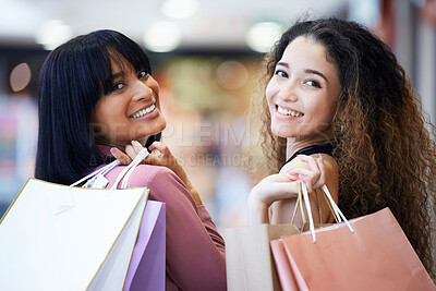 Buy stock photo Friends portrait, shopping and women walking in a mall together for retail therapy, sale and customer discount. Paper bag, fashion and females excited for clothes, promotion and commerce on travel