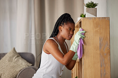 Buy stock photo Dust, check and black woman cleaning a shelf, furniture inspection and housework routine. Service, hygiene chores and African cleaner doing housekeeping service with focus in living room of a home
