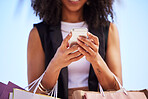 Hands of black woman, smartphone and outdoor for shopping, retail and social media for connection, typing and city. Female, girl and cellphone for ecommerce, check online sales and boutique purchase