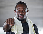 Black man, boxing and fist with fitness portrait, sports and martial arts with exercise and earphones for music. Athlete, boxer and MMA fighter with towel, workout and training with audio streaming
