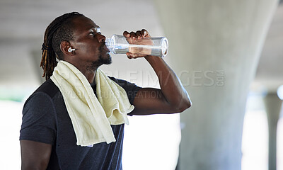 Buy stock photo Exercise, black man and water bottle for workout, fitness and training for health, wellness and outdoor. Athlete, African American male and drinking for hydration, rest and motivation for sports, 