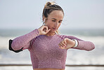 Young woman, fitness and heart rate on neck pulse for nature training. Sports runner, athlete and girl check smart watch, health progress or exercise time to monitor workout progress, energy and body