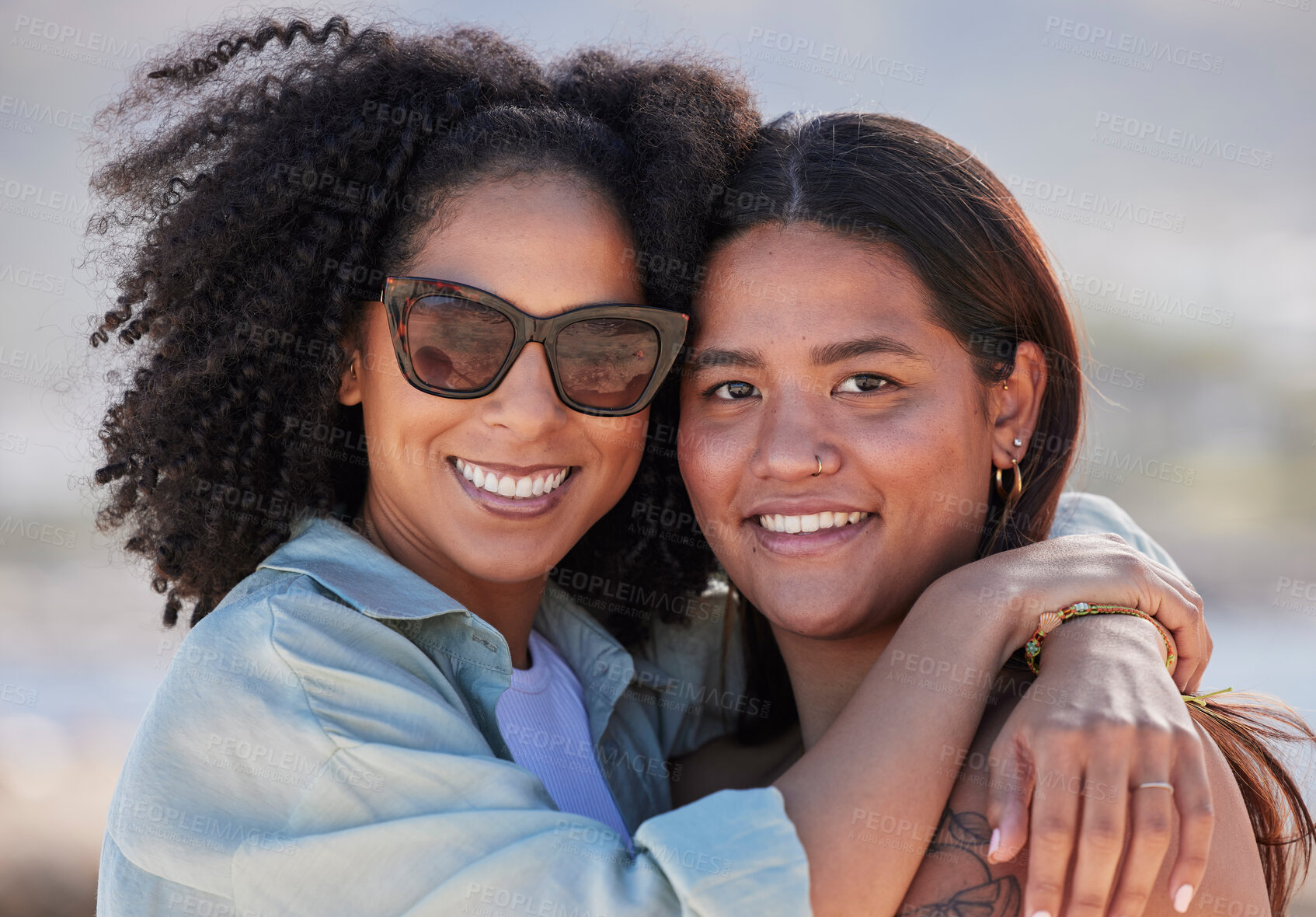 Buy stock photo Women, lgbtq and happy beach portrait for love, hug and care on summer holiday, vacation and rainbow pride. Gay, lesbian and young couple of friends relax at sea, ocean or outdoor happiness in nature