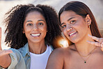 Lesbian women, beach portrait and selfie for peace, love and face on summer holiday, travel and freedom. Gay, happy and couple of friends taking photograph at sea for social media, video call or date