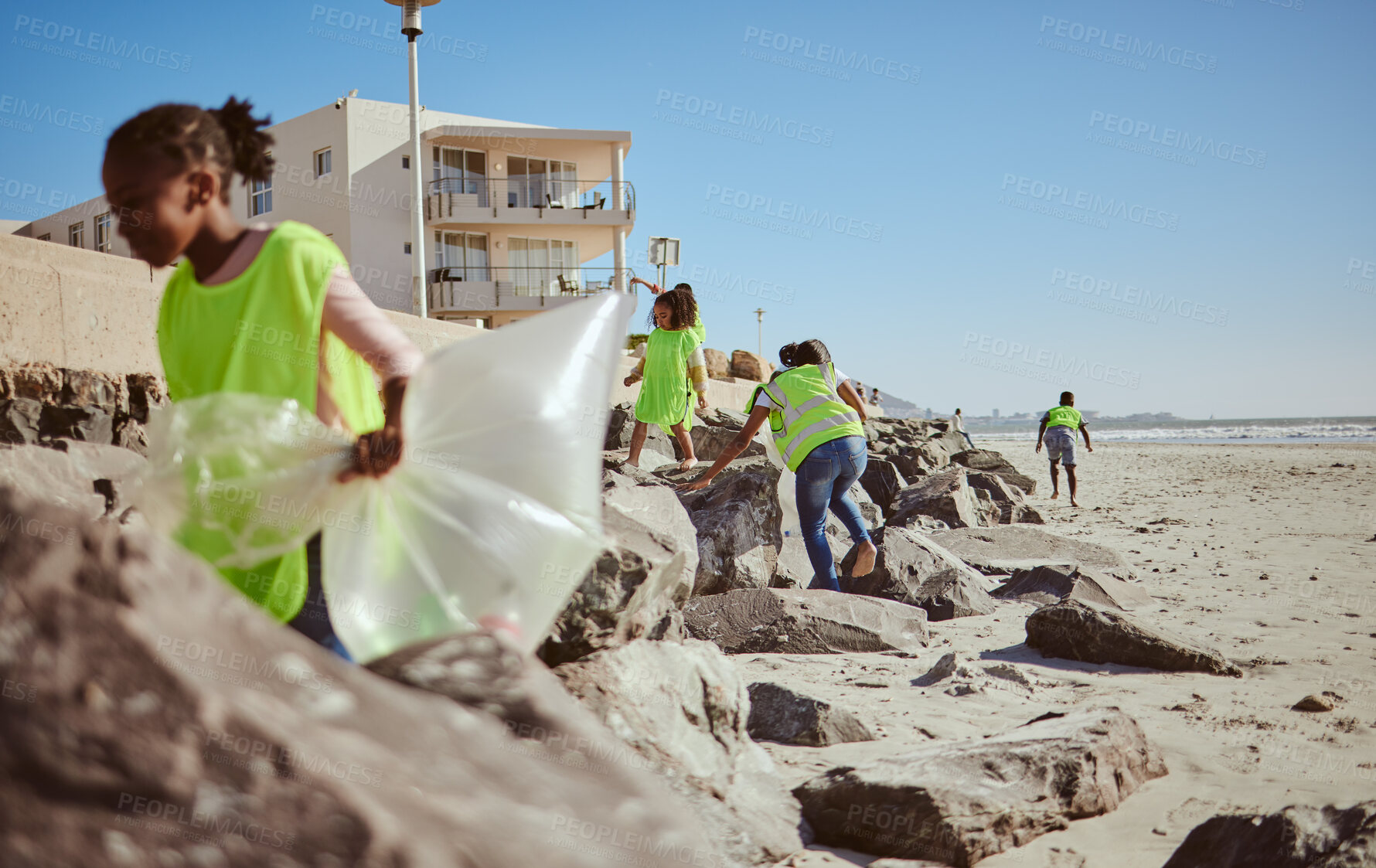 Buy stock photo Beach cleaning, plastic and children volunteer for education, learning and community help in climate change project, ngo and charity. Friends or students with waste, garbage or trash for earth day