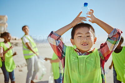 Buy stock photo Child, portrait and plastic bottle on nature beach, waste management collection and ocean school cleanup. Smile, happy kids and volunteering in climate change cleaning and community service recycling
