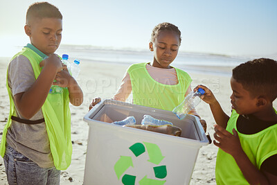 Buy stock photo Group of children cleaning beach or recycling plastic for education, learning or community help in climate change project, ngo and charity. African friends with recycle box and teamwork on earth day
