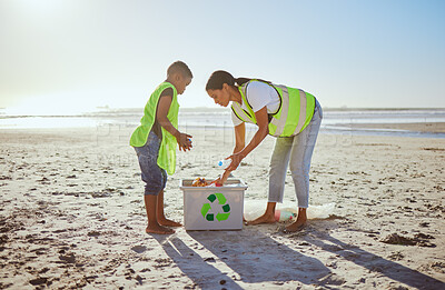 Buy stock photo Recycle, plastic and mother with child in beach cleaning education of sustainability, green environment or eco friendly ocean. Mother or volunteer family with box at sea for pollution or earth day
