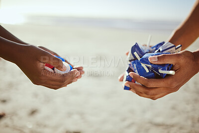 Buy stock photo Cleaning, plastic and hands of volunteer at beach for recycle, environment or earth day. Recycling, sustainability and climate change with charity team and trash for pollution, eco friendly and help