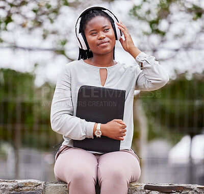 Buy stock photo Headphones, black woman and outdoor for peace, happiness and audio with young student calm in park. African American female, lady or girl with folder, headset for podcast or streaming music in nature