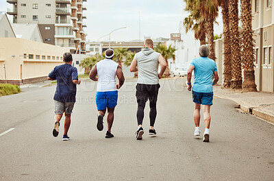 Buy stock photo Fitness, running and teamwork with friends in city for stamina, cardio and endurance training. Sports, jogging and community with group of runner sprinting in town for workout, exercise and health