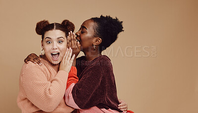 Buy stock photo Friends, gossip and women share secret on studio background and product placement mockup. Secrets, rumours and surprise whisper in ear, black woman with happy woman discuss discount sale announcement