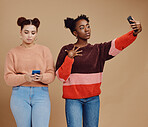 Selfie, trendy friends or women isolated on studio background for social media, profile picture and phone. Smartphone, gen z and beautiful black woman, people or influencer person on networking app