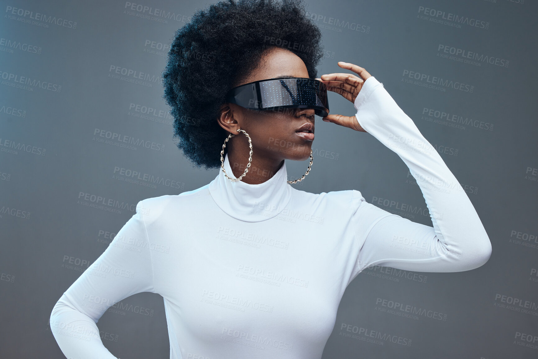 Buy stock photo Futuristic sunglasses, fashion and black woman, young gen z and stylish with trendy designer brand against studio background. Model, cyberpunk and natural curly hair with beauty and edgy style