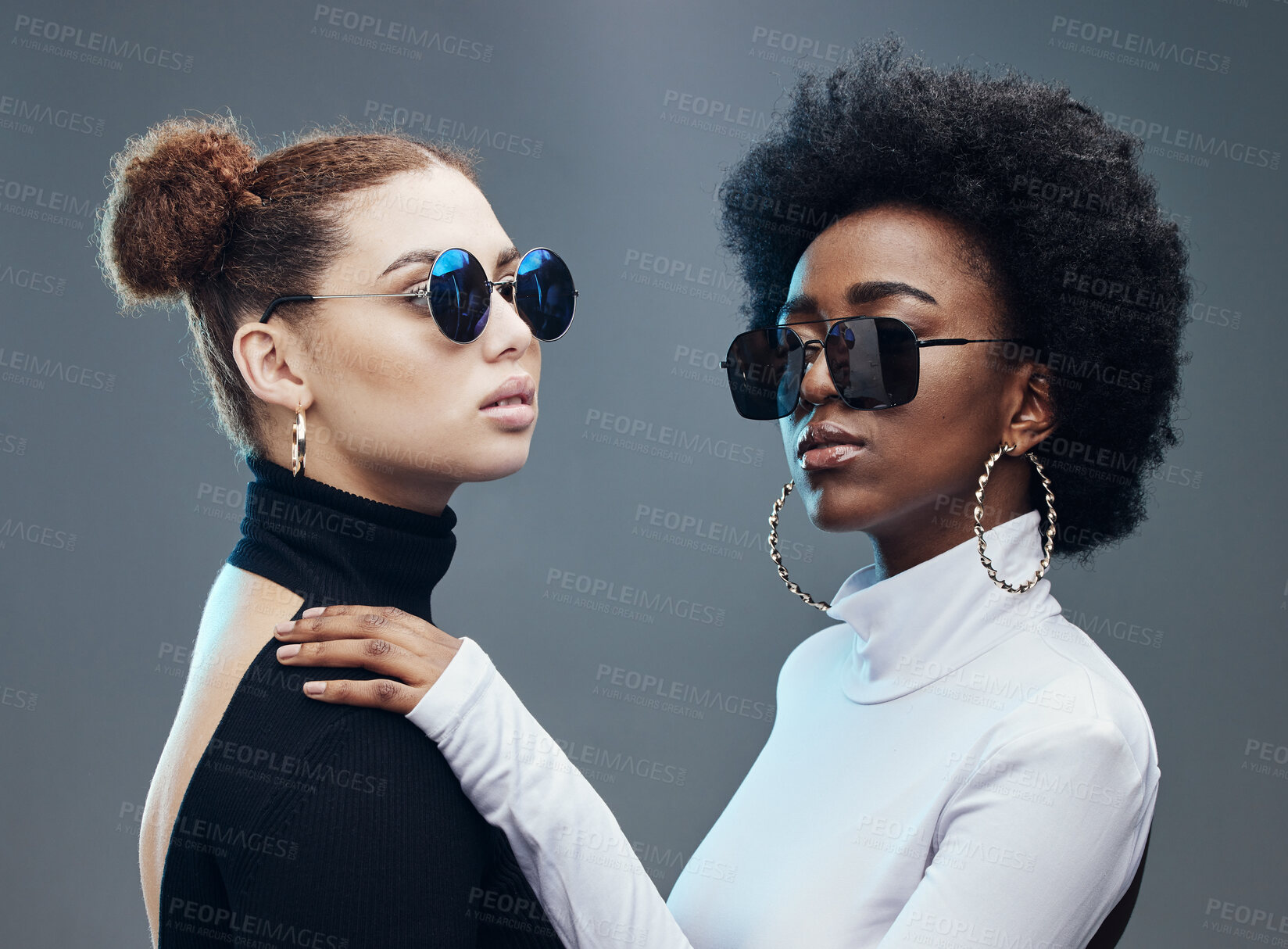 Buy stock photo Fashion, friends and women with sunglasses in studio for cosmetics, makeup and futuristic style. Luxury models, designer brand and confident girls with stylish accessory, trendy clothes and jewellery