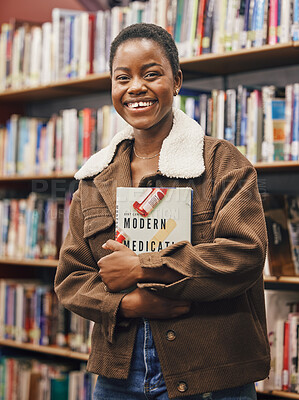 Buy stock photo Black woman student, portrait and library with book, research or medical education with smile. African gen z woman, books and shelf at university for goals, learning and motivation for future career