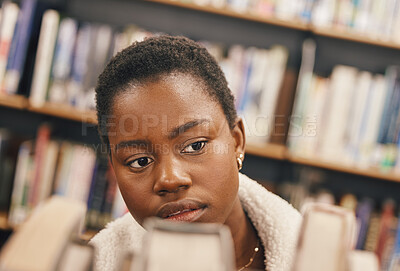 Buy stock photo Thinking student, face and searching library books in college education, school learning or university studying. Black woman, customer and research notebook on bookshelf store in scholarship reading