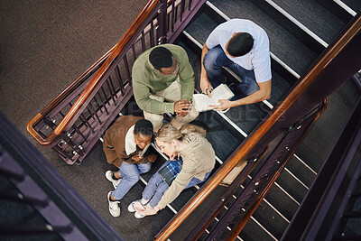 Buy stock photo Above, student group and stairs for reading together, studying and research for exam, test or education. Students, diversity and teamwork for success, goals and motivation at college, campus or focus