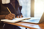 Student, hands and writing in notebook, studying and learning for exams, test and creative. Black person, make notes and laptop for typing, connection and prepare for proposal, university or academic