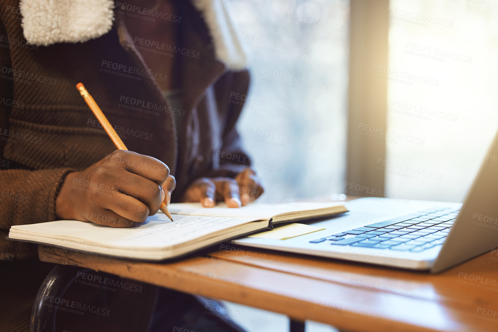 Buy stock photo Student, hands and writing in notebook, studying and learning for exams, test and creative. Black person, make notes and laptop for typing, connection and prepare for proposal, university or academic