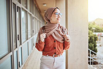Buy stock photo University, Muslim and campus student walking, happy and relax on journey to class, education learning or lecture study. School, hijab and Islamic woman, college girl or person on walk in Indonesia