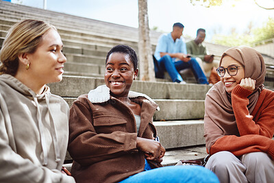 Buy stock photo Happy women, diversity or talking on university stairs, school steps or college campus in bonding class break. Smile, black woman or muslim students laughing in relax education group or learning rest