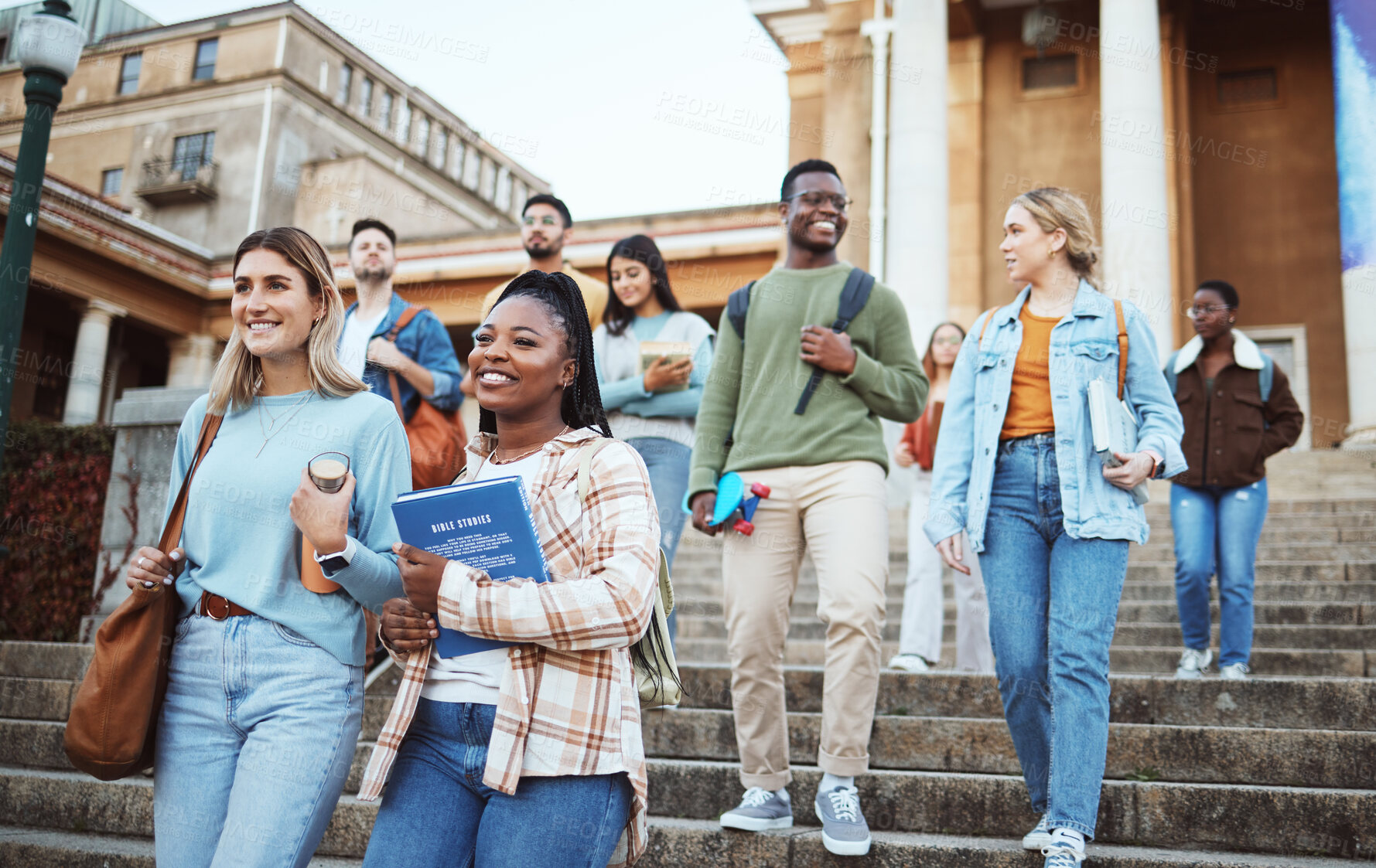 Buy stock photo Diversity, students and walking on university steps, school stairs or college campus to morning class. Smile, happy people and bonding education friends in global scholarship opportunity or open day