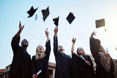 Buy stock photo Graduation, education and success with friends in celebration as a graduate group outdoor, throwing mortar caps. Diversity, university and man and woman students celebrating a college diploma