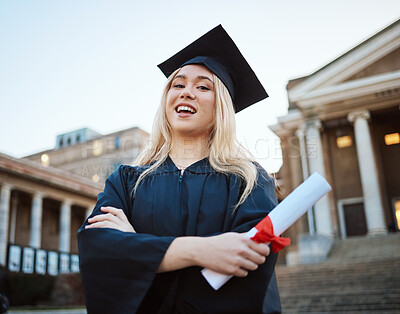 Buy stock photo Portrait, graduation and success with a student woman holding a diploma or certificate outdoor as a graduate. Study, goal or unviersity with a female pupil standing outside after scholarship study