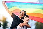 Love, lesbian and couple with pride, lgbtq and happiness for relationship, smile and rainbow flag. Women, friends and queer people bonding, loving and dating for romance, sexuality or gender equality