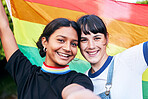 Portrait, lesbian and couple with flag for pride, freedom and happy or bonding at festival. Face, lesbian couple and rainbow flag for human rights, lgbtq and liberation while standing, love and smile