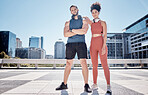 Black couple, outdoor training portrait and headphones for support, motivation and workout in city. Exercise, couple teamwork and goals for health, wellness and development with music by buildings