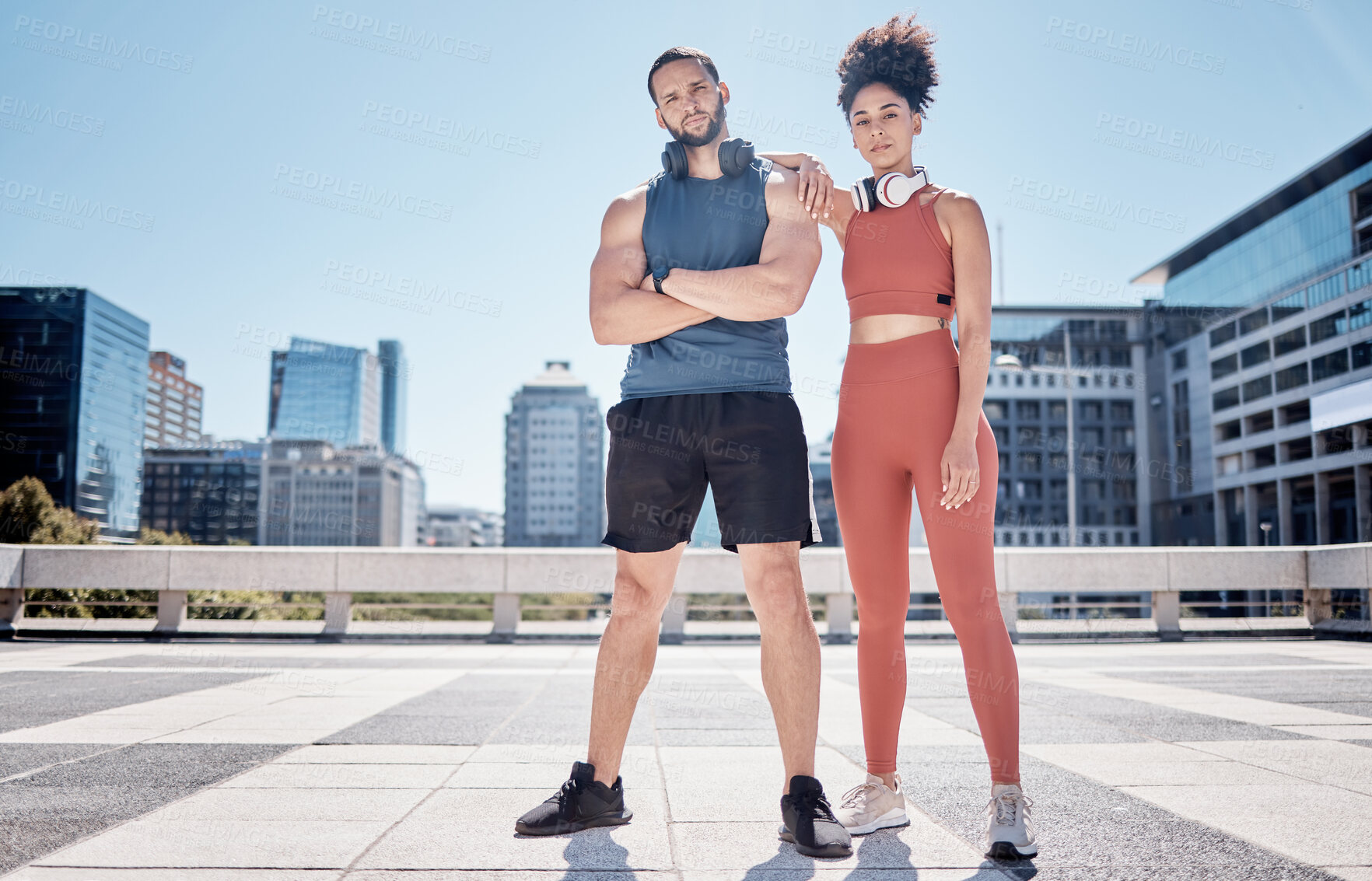 Buy stock photo Black couple, outdoor training portrait and headphones for support, motivation and workout in city. Exercise, couple teamwork and goals for health, wellness and development with music by buildings