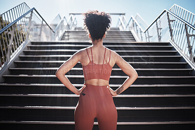 Buy stock photo Fitness, woman and stairs for sport in city for running, exercise or healthy cardio preparation. Back of African American female ready for training, workout or sports run for wellness by staircase