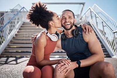Buy stock photo Sports, love and woman kissing man on stairs in city on break from exercise workout. Motivation, health and fitness goals, couple rest and kiss with smile on morning training run together in New York